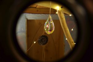 Magical treehouse touches like lights and glass.