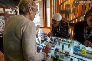 Educator Wacheke helps a customer that may not be what people think when they think of a cannabis user.