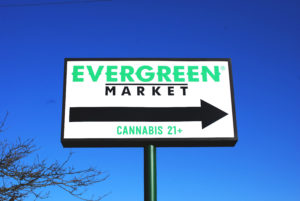 The entry sign for Evergreen Market Bellevue dispensary